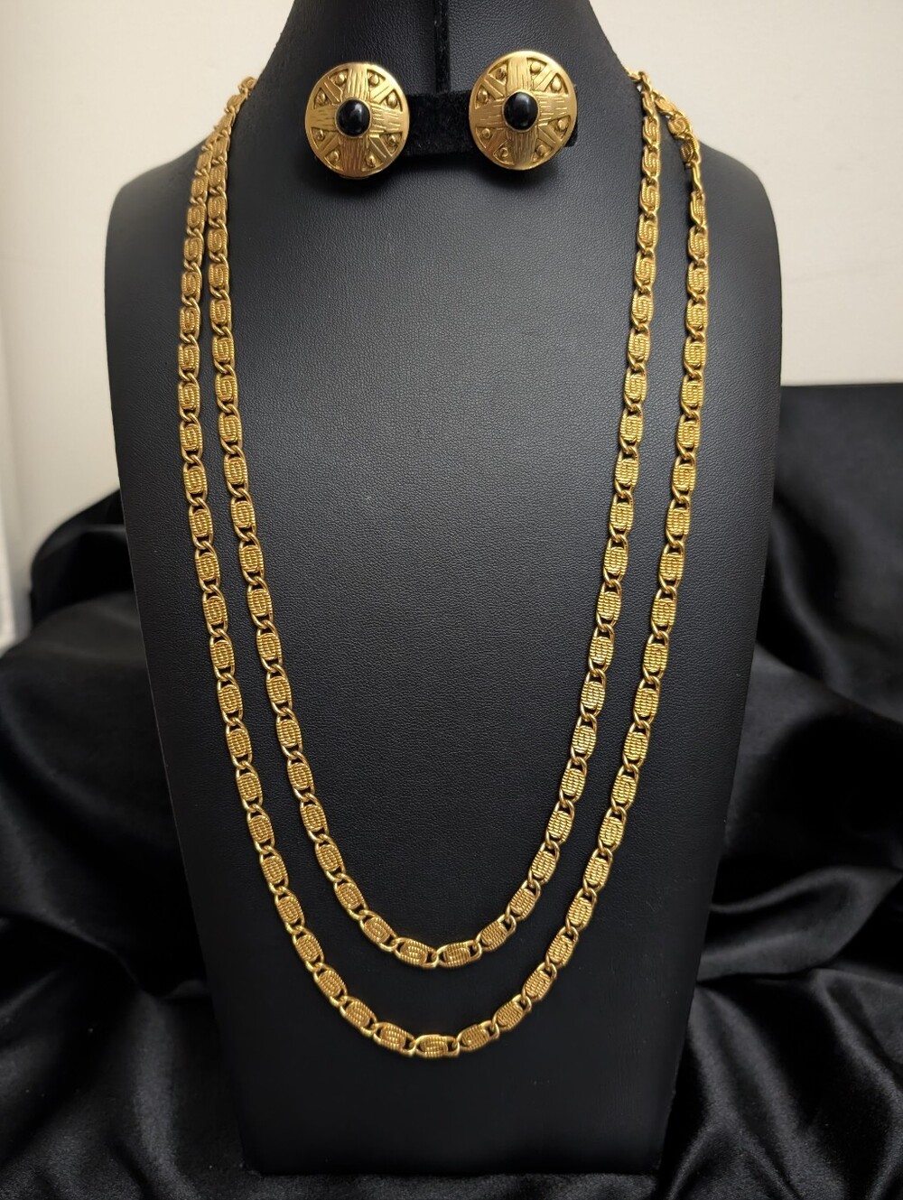 #7. Monet 54" Gold-Tone Necklace with Black Accent Clip-On Earrings